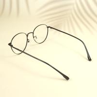 Black round unisex metal eyeglasses ( eq0027 35045 )